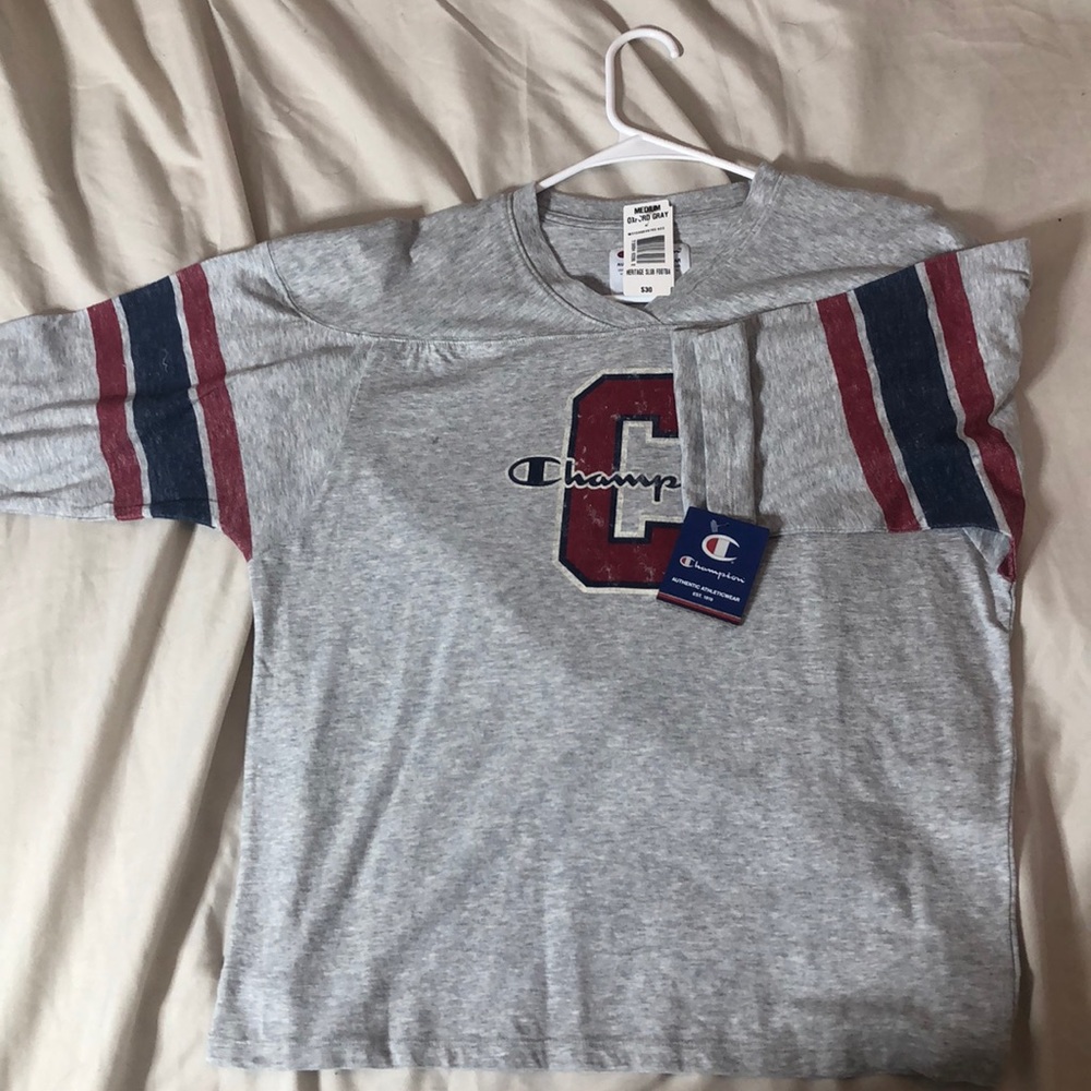 Champion mid sleeve shirt.